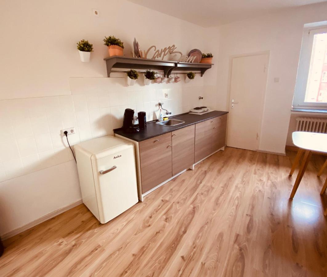 Tm Aparts Dortmund Kültér fotó A typical kitchen in a student apartment